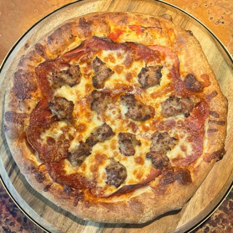 Indulge in Our Meat Lovers Pizza
